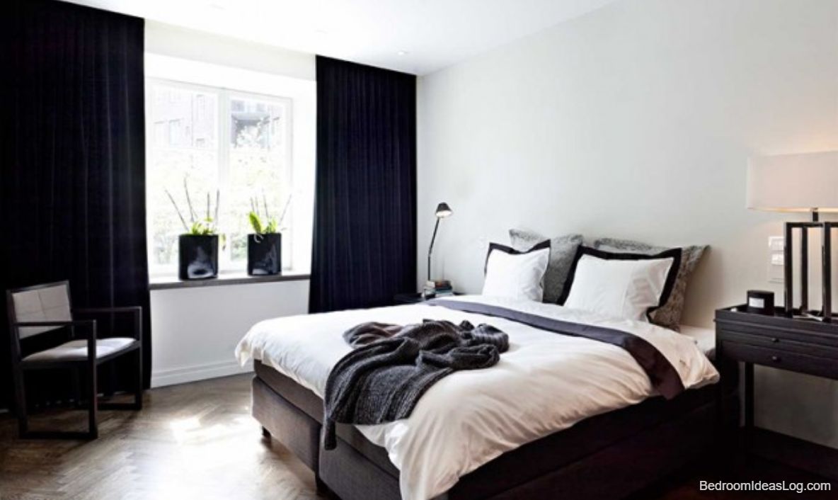 white walls and black bedroom curtains
